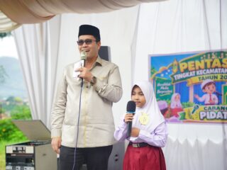 Bupati Haili Yoga Apresiasi Siswa Rutin Tahajud dan Program Baca Al-Quran Dalam Pembukaan Pentas PAI Se-Kecamatan Lut Tawar